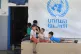 Palestinian children who fled with their parents from their 