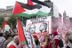 Demonstrators march outside of the U.S. Capitol as they prot