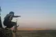 YPG fighters keep guard upon a hilltop 