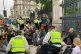 XR activists glue themselves to Parliament's gates