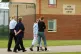 Young offenders escorted by staff at Rainsbrook Secure Train