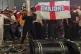 Black and white England fans together in Piccadilly Circus a