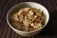 A bowl of cornflakes cereal