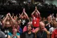Delegates voting at conference