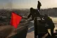 IFB member hoist the red flag over Raqqa