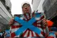 South Korean protesters hold Japanese rising sun flags durin