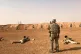 Smoke rises from a rebel encampment hit by Syrian troops thi