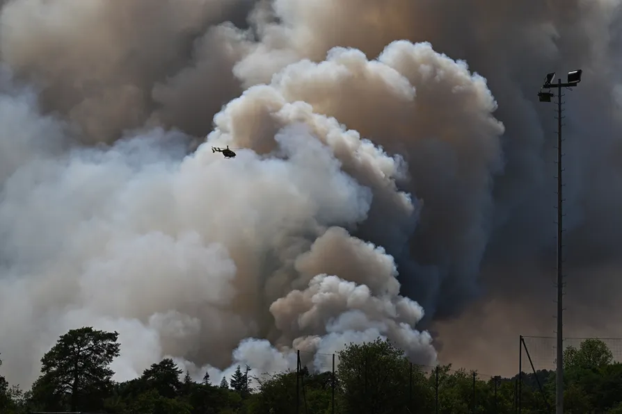 Macron holds crisis meeting over massive wildfires
